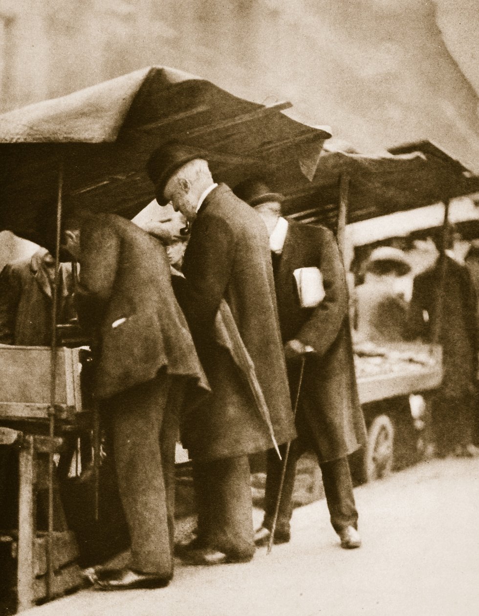 A bookstall at Farringdon Road Market by English Photographer