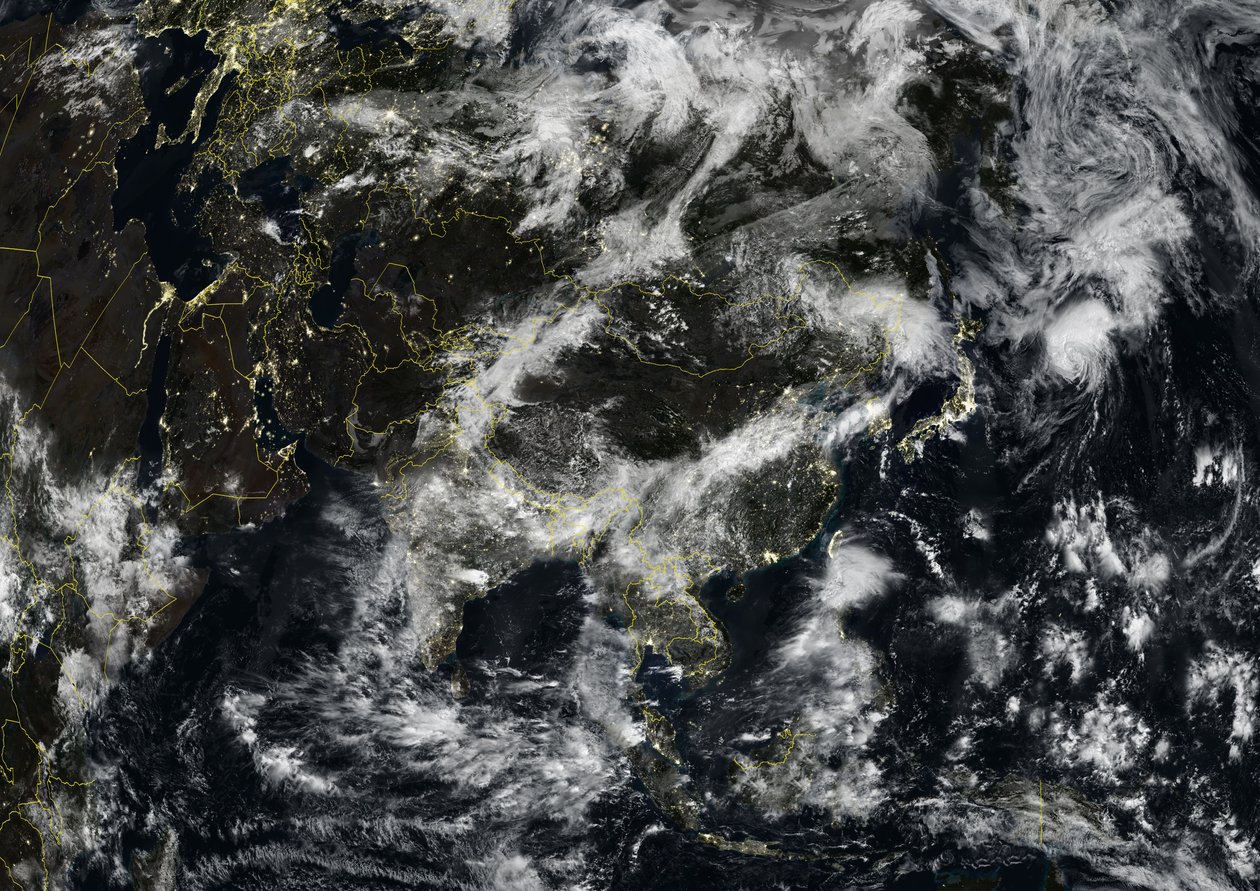 Asia at Night with Country Borders and Cloud Coverage, True Colour Satellite Image by Unknown