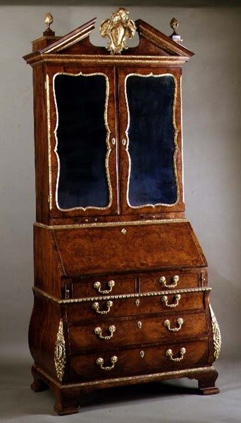 George I bureau bookcase with bombe sides and ormolu mounts by English School