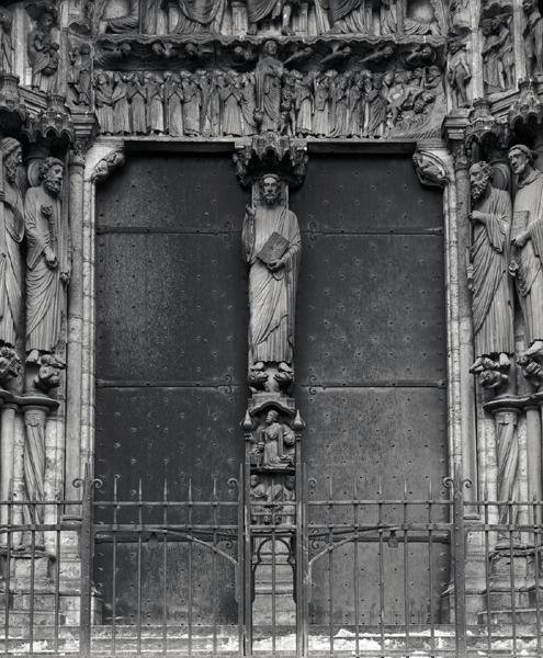 Beau Christ figure on the trumeau of the south portal by French School