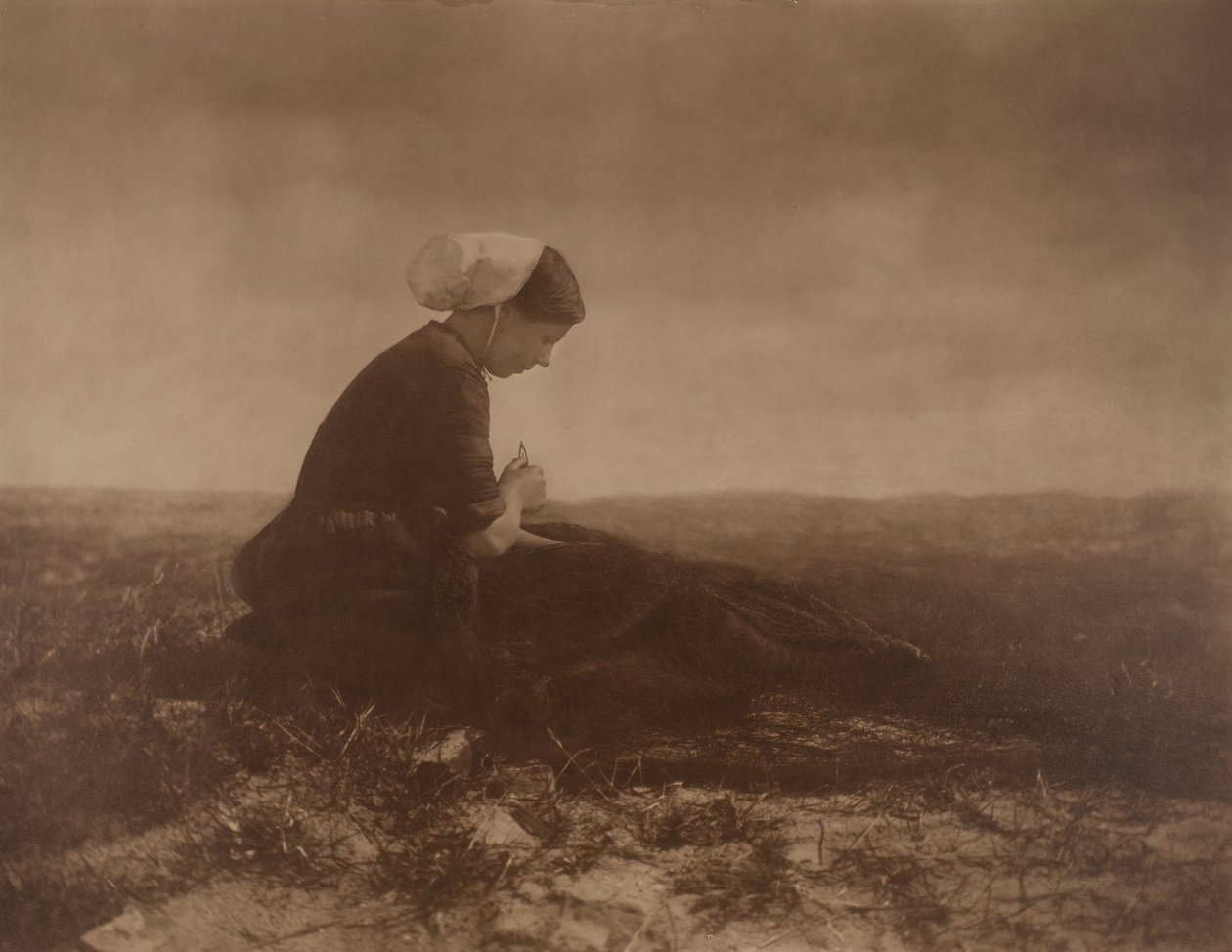 The Net Mender by Alfred Stieglitz