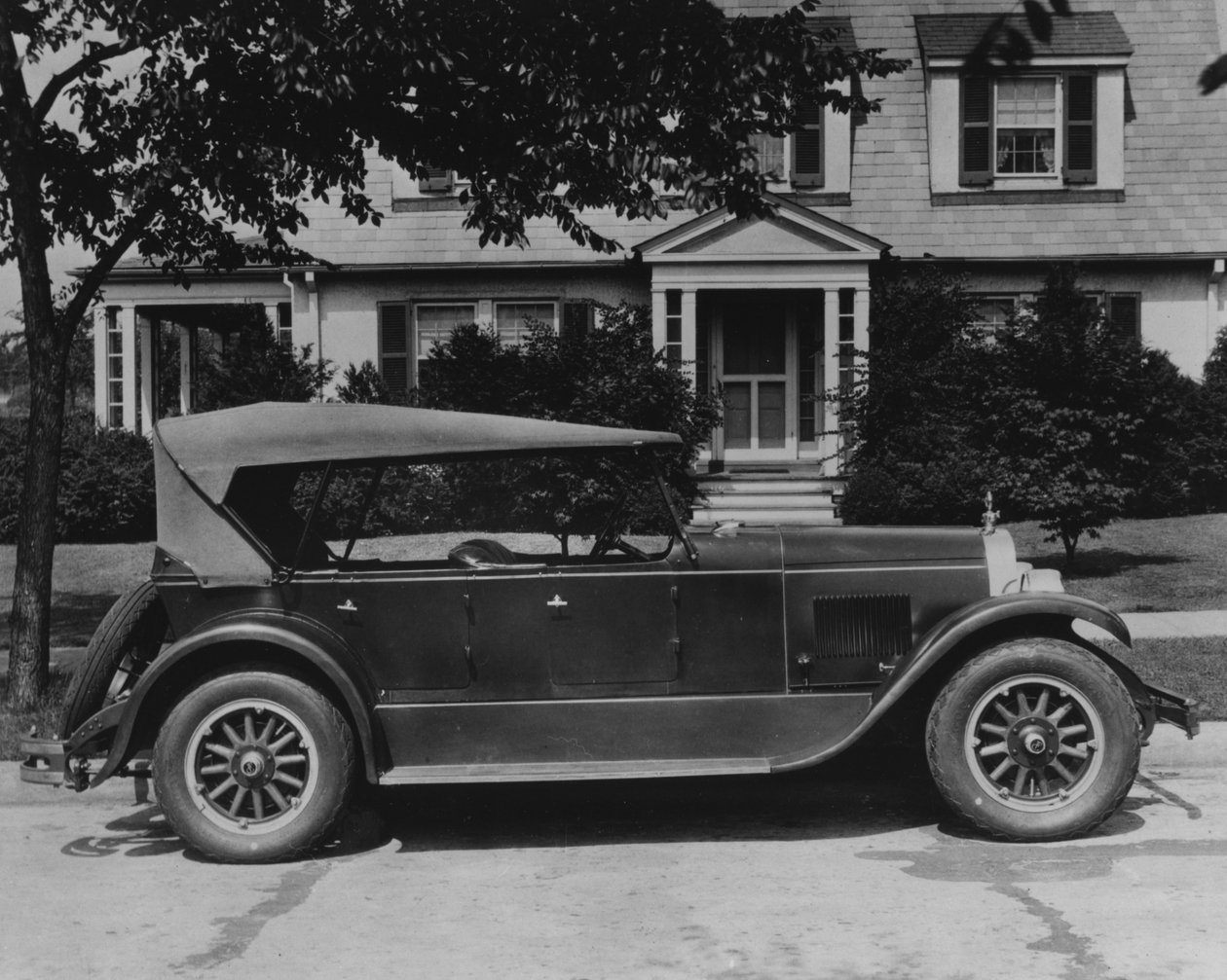 DuPont Automobile on Front of House, c.1919-30 by American Photographer