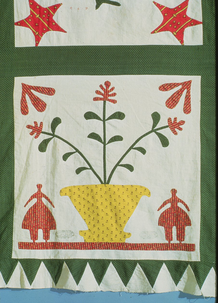 Quilt (detail) showing figures and flowers by American School