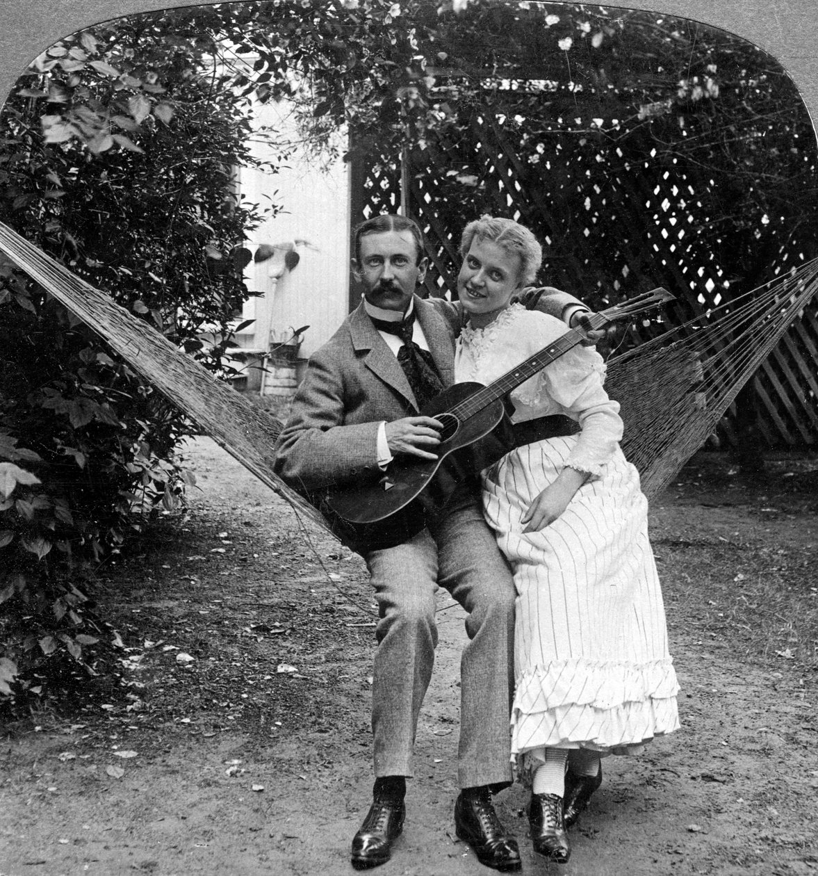 The Musical Pair in the Hammock by American Stereoscopic Company