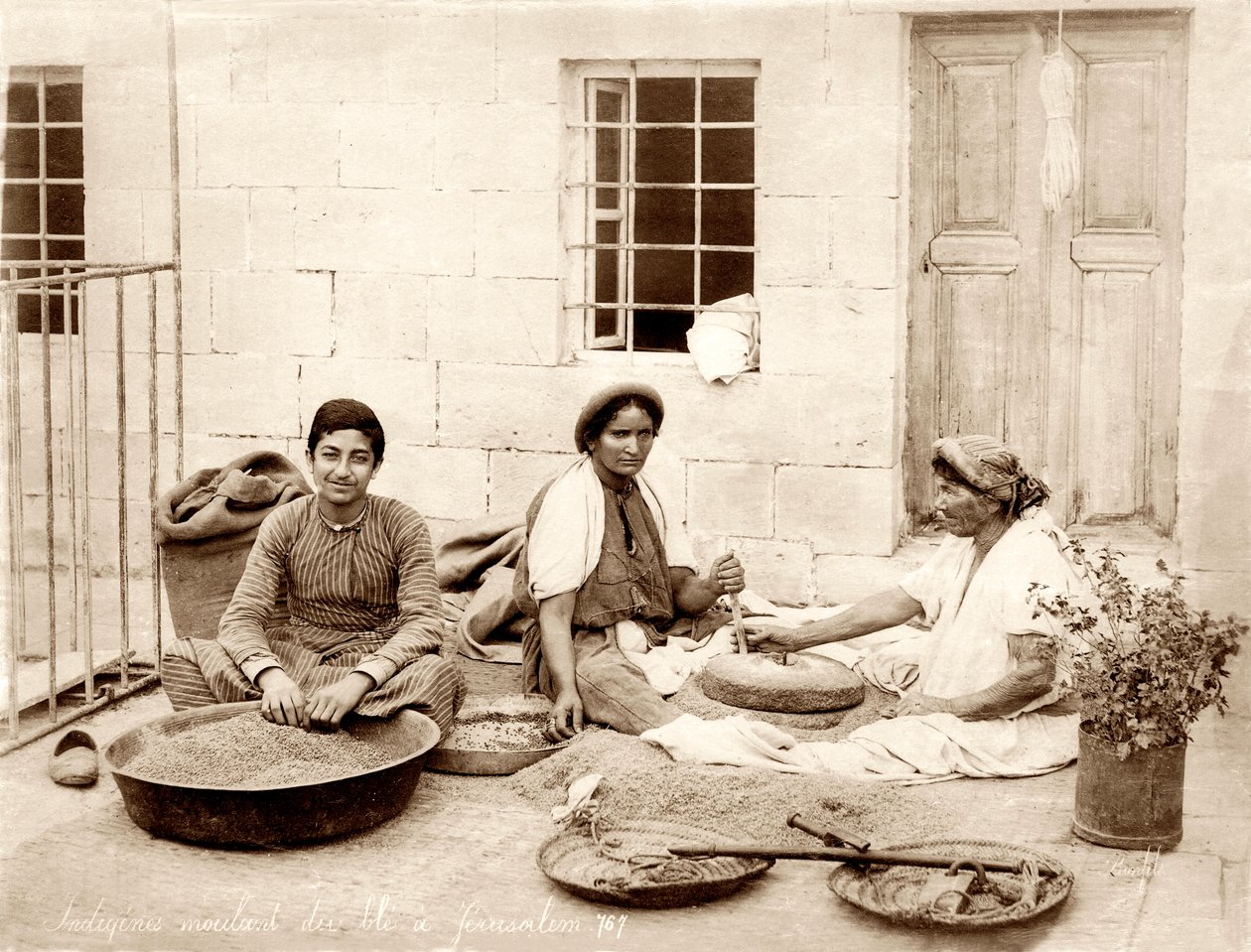 Grinding wheat in Jerusalem, c.1867-98 by Bonfils Studio