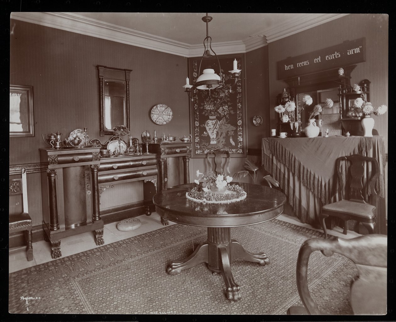 A dining room in the home of Mrs. Elliott by Byron Company