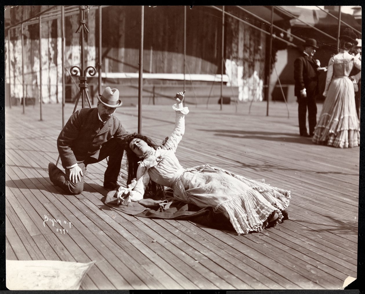 An Actress in Costume Rehearsing on the Roof of What is Probably the New York Theatre, New York by Byron Company