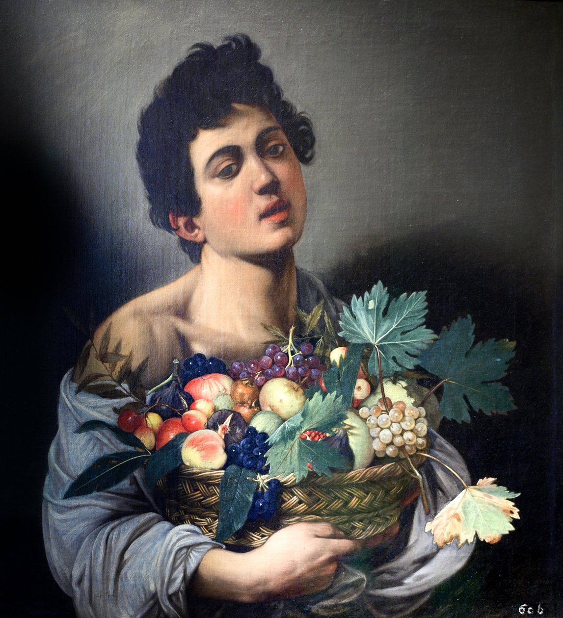 Boy with a Basket of Fruit by Caravaggio by Michelangelo Merisi Caravaggio