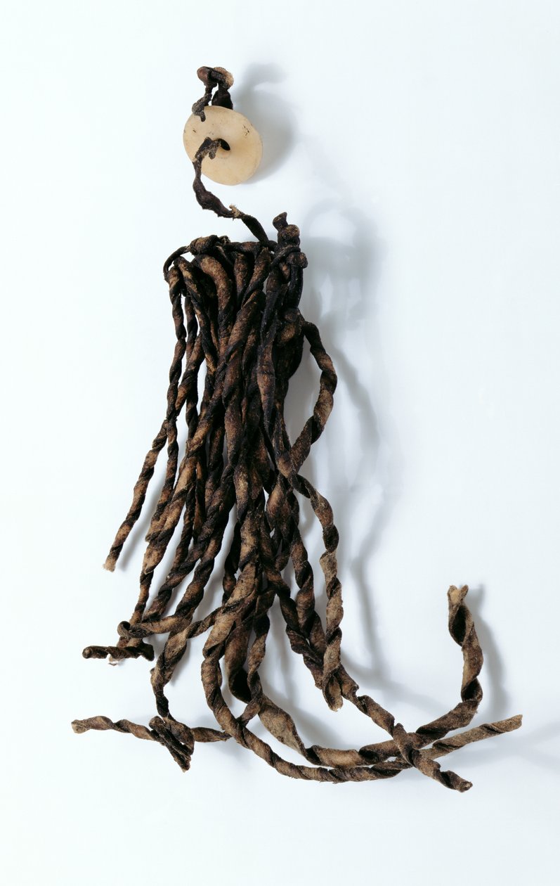 Tassel with pierced round disc, found with the Oetzi Iceman by Copper Age