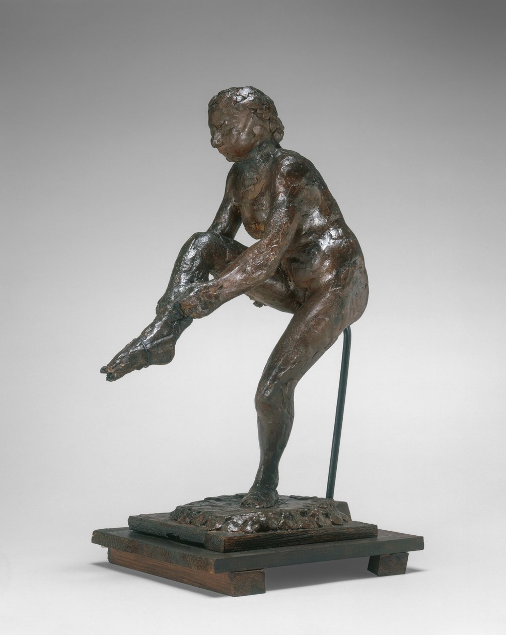 Dancer Putting on Her Stocking by Edgar Degas