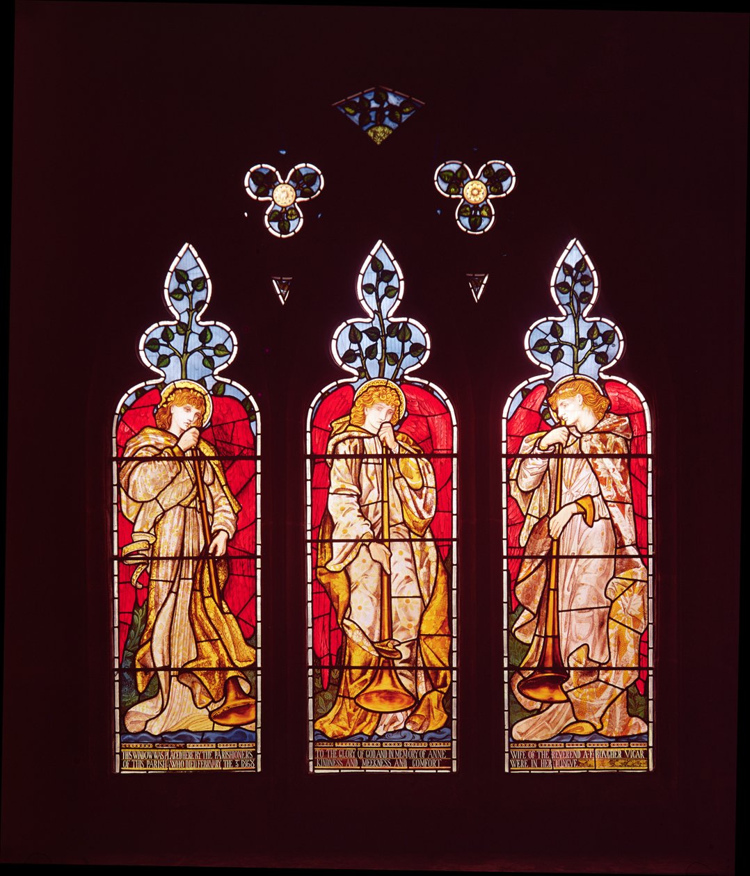 Three Trumpeting Angels, south aisle window, made by Morris, Marshall, Faulkner and Co. by Edward Burne Jones