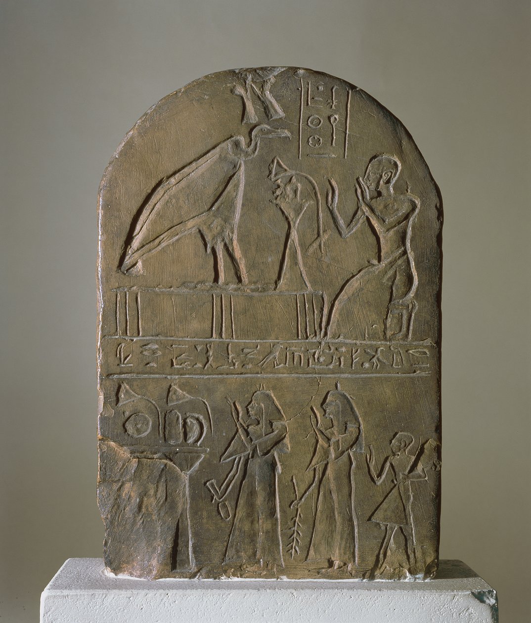 Stela of the vulture goddess Nekhbet of Nekheb dedicated by a priest of the Temple of Horus Behdety who is shown in the top register, found at Edfu by Egyptian