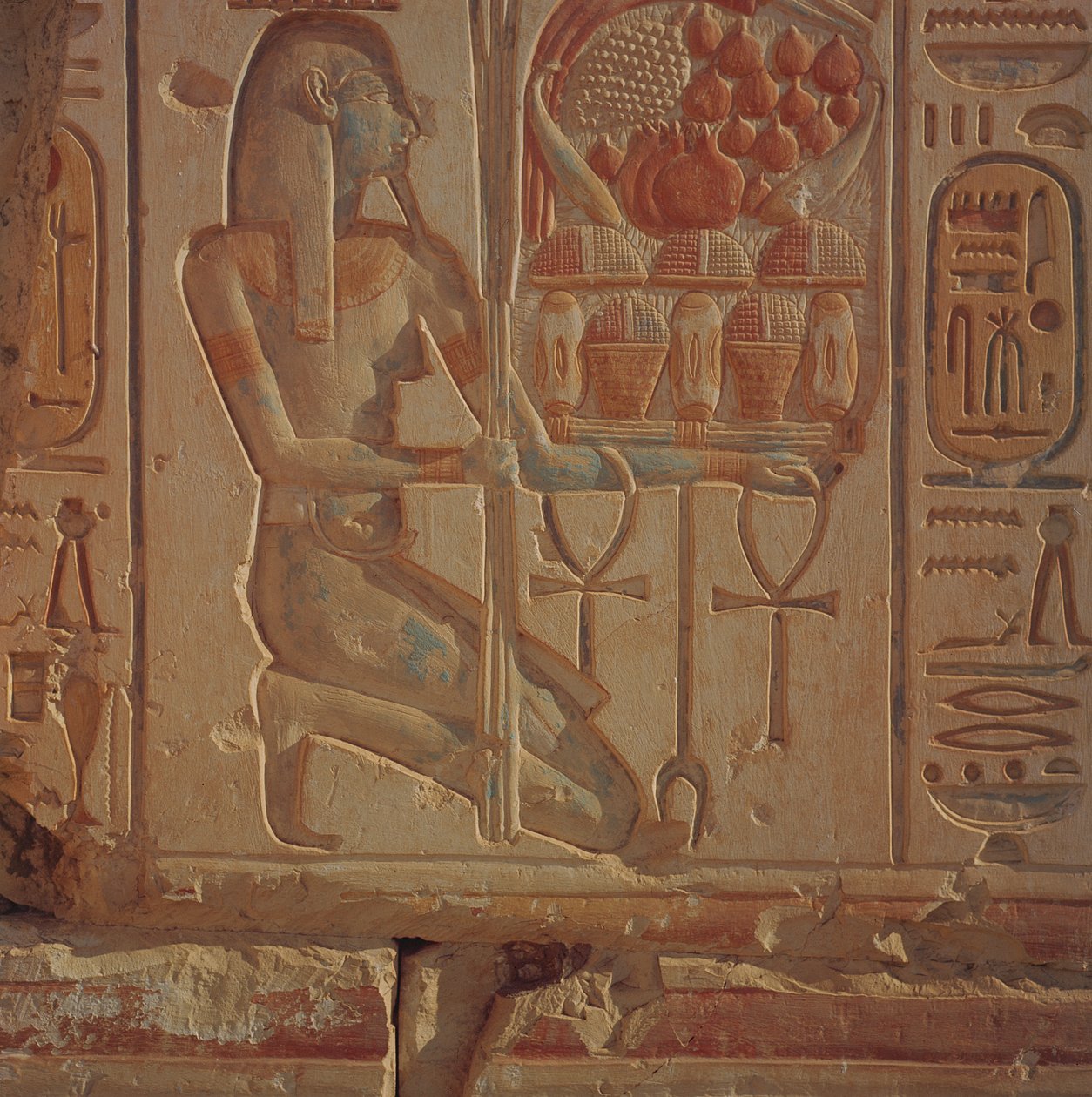 Kneeling figure presenting baskets of food, from the Temple of Ramesses II, New Kingdom, c.1304-1270 BC by Egyptian 19th Dynasty