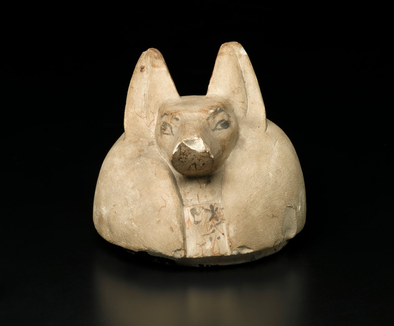 Jackal-Headed Cover of a Canopic Jar by Egyptian