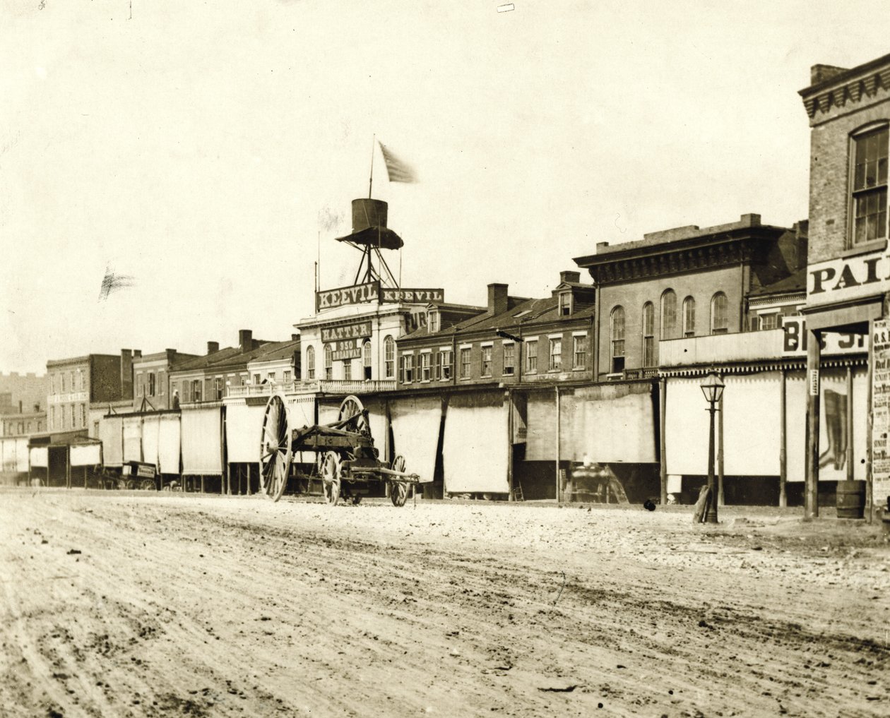 Commercial buildings along Broadway south of Carr Street. Keevil Hatter is pictured at 950 Broadway by Emil Boehl