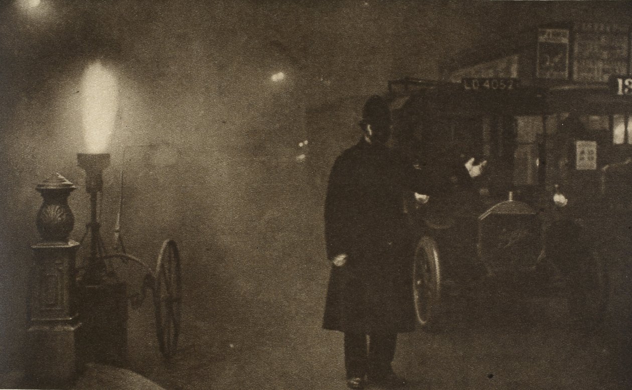 A constable directing traffic in the fog, where Charing Cross meets Trafalgar Square by English Photographer