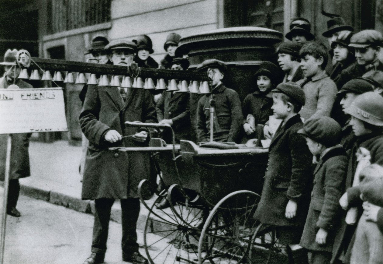 Bells being played in the streets by English Photographer