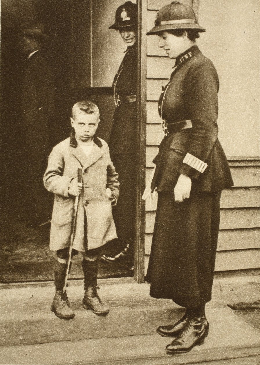 East End child with a policewoman by English Photographer