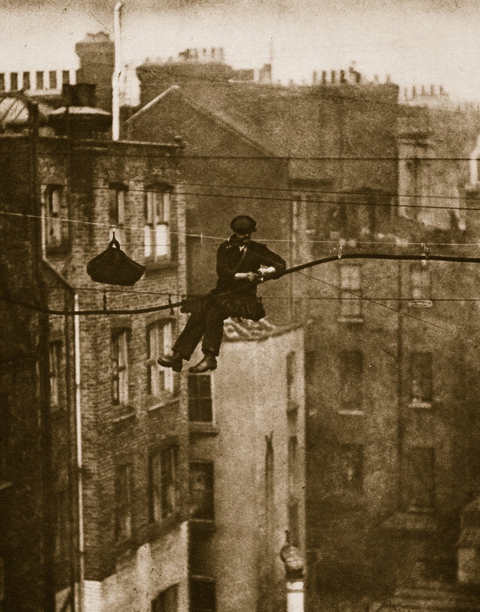 Inspecting a telephone cable between Conduit and Maddox Streets by English Photographer