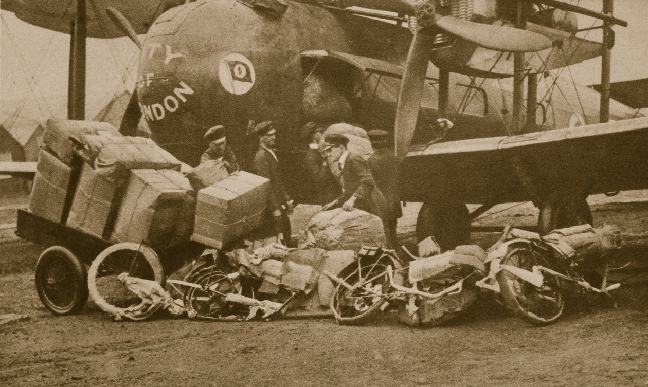 Loading the Vickers-Vimy machine City of London with motorbike frames for Cologne by English Photographer