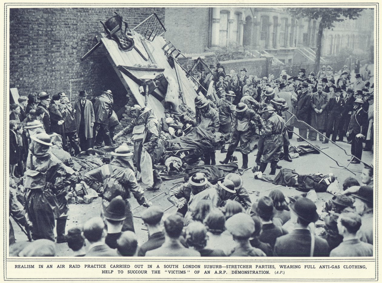 Realism in an air raid practice carried out in a south London suburb, from The Illustrated War News, published 8th November 1939 by English Photographer