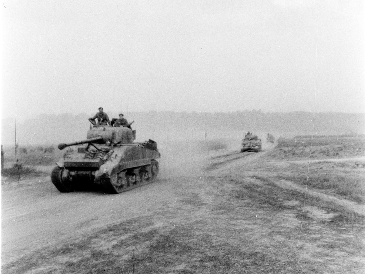 Tanks on the Move to Vire Over the Tank Runs, c.1945 by English Photographer