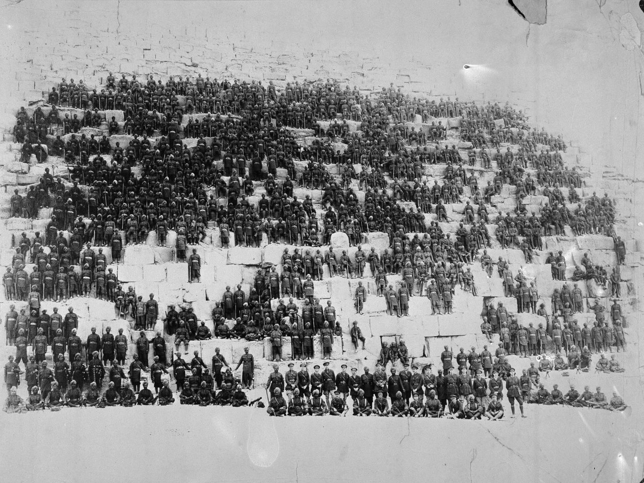 The 38th Dogras posed on one of the pyramids, Egypt, 1918 by English Photographer