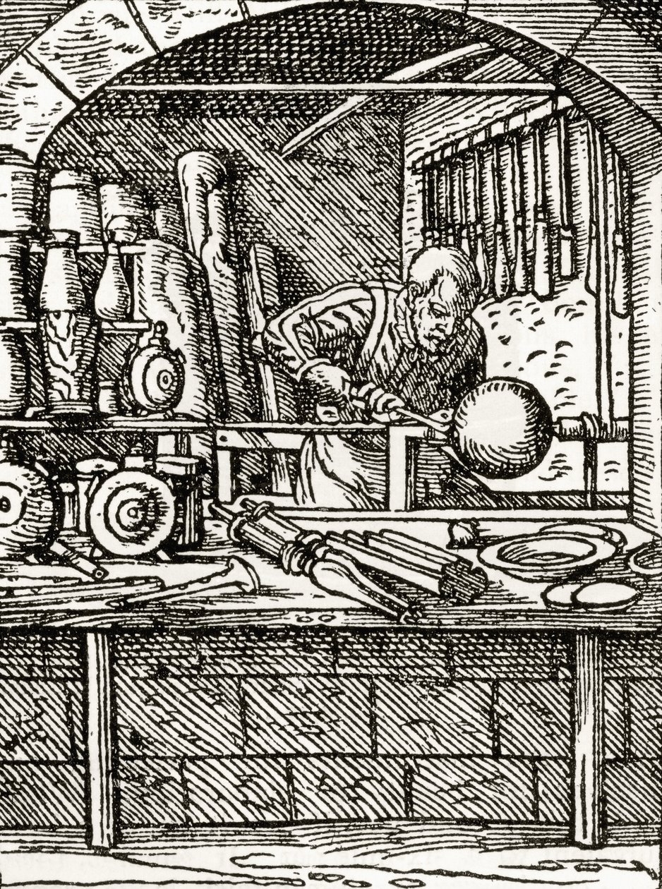 A lathe turner at work in the 16th century, from 