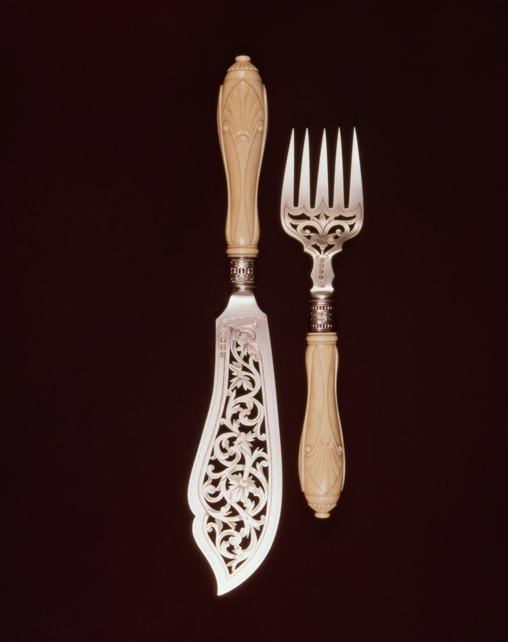Fish-servers with carved ivory handles by J.Whipple and Co., Exeter, 1880 by English School