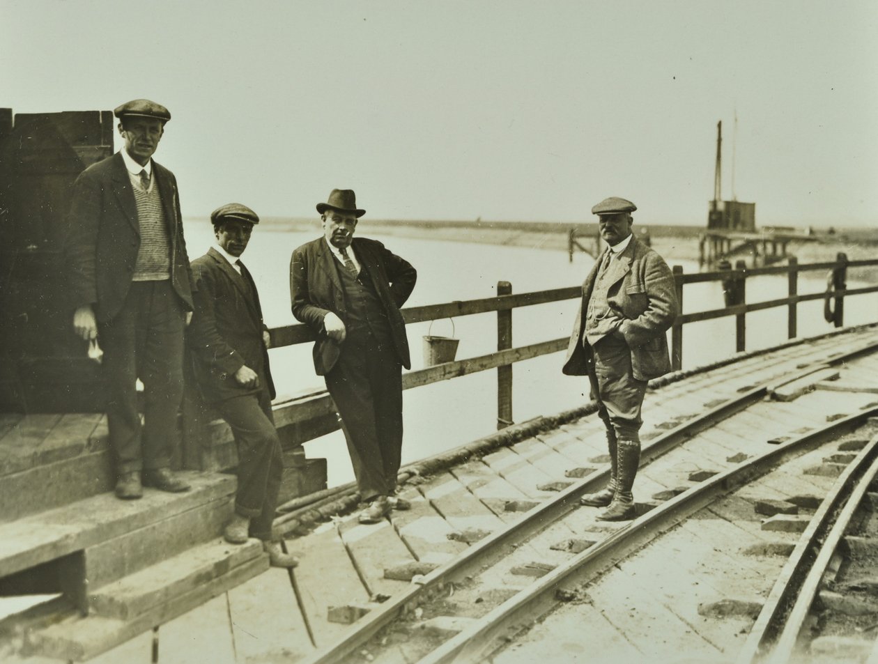 Group of men at Becontree Estate by English Photographer