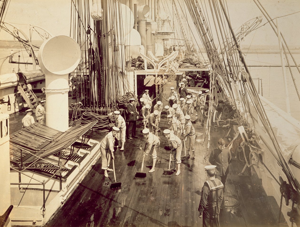 Scrubbing the deck of the HMS Calliope by English Photographer