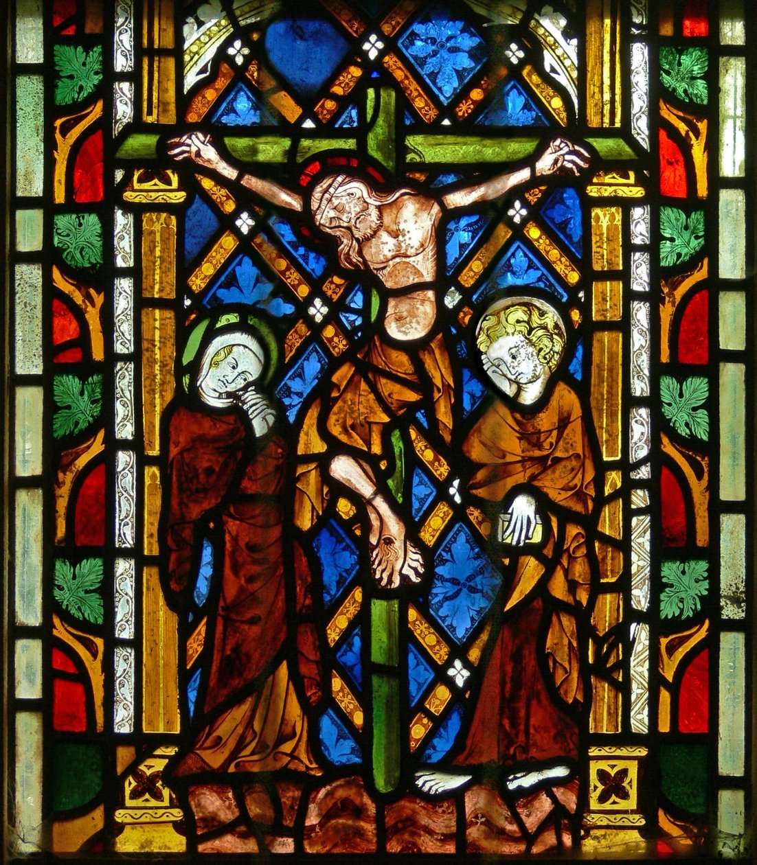 The East window depicting the Crucifixion by English School