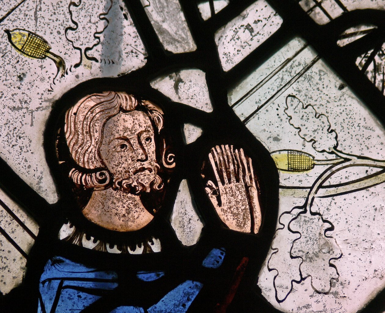 Window depicting a donor by English School
