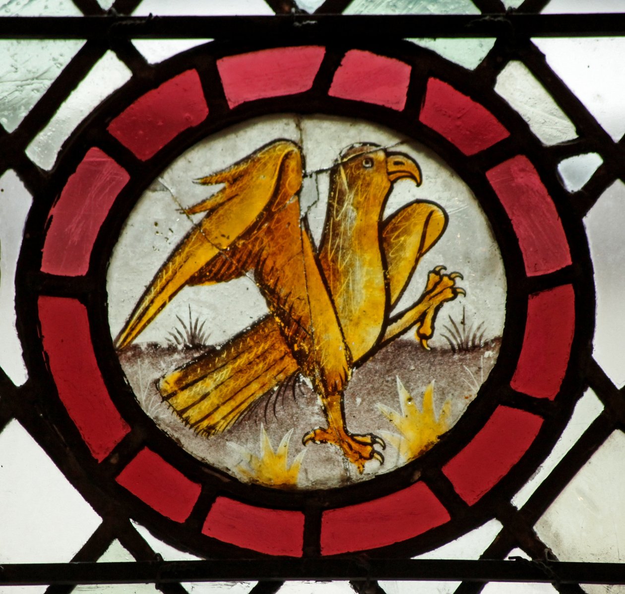 Window depicting an eagle by English School