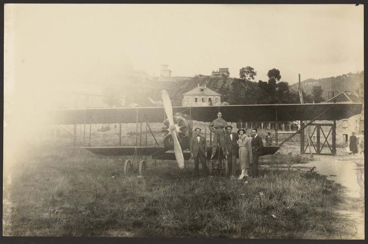 Group Portrait in Front of Airplane by Fedele Azari