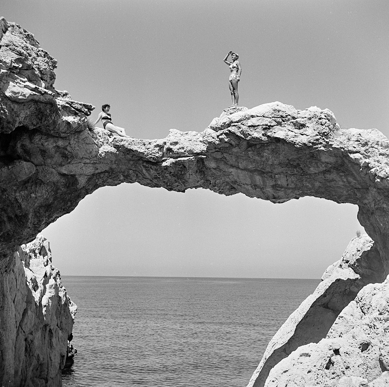 Rock arch on the sea at Aspra by Fosco Maraini