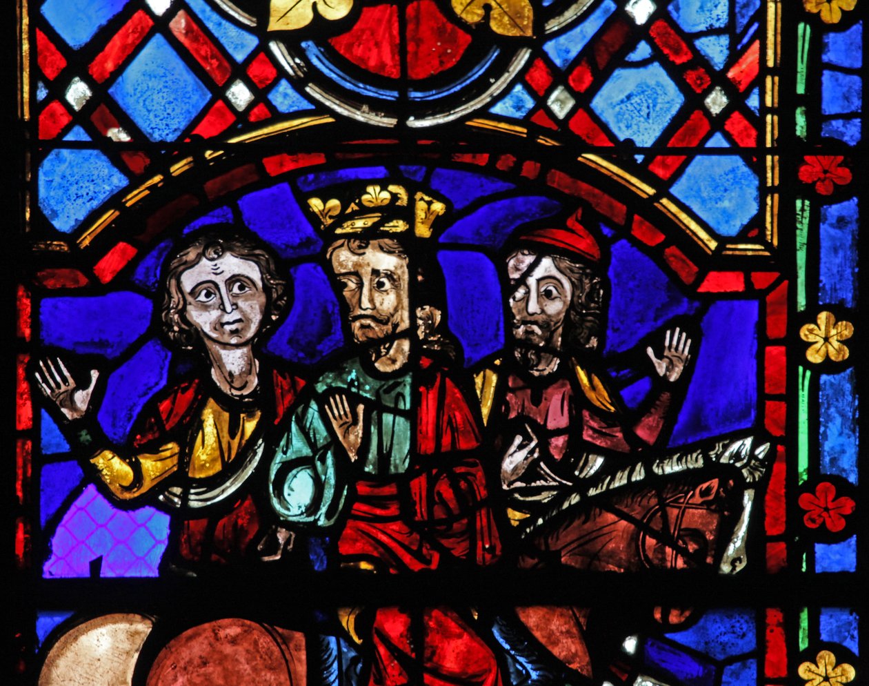 Window depicting medieval faces by French School