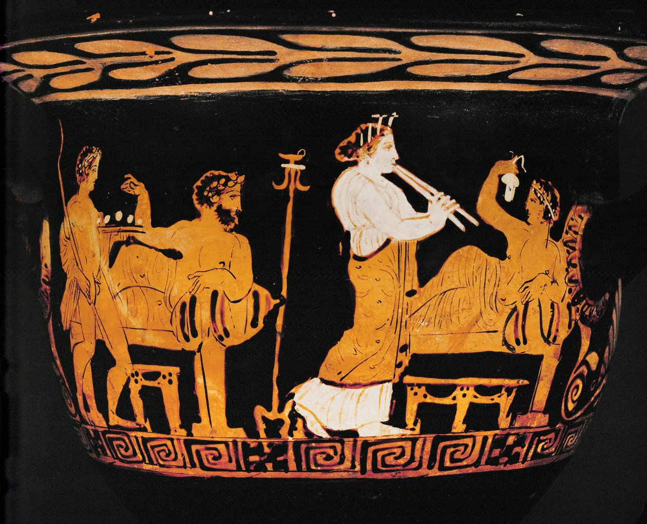 Banqueting scene by Greek Greek