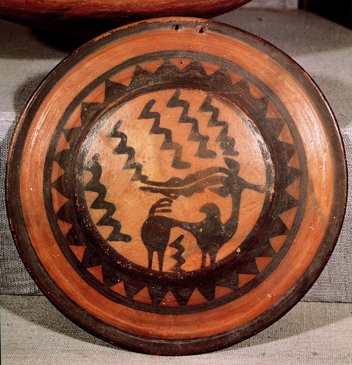 Cover of a funerary urn depicting an ibex and a geometric pattern, from the Indus Valley, Pakistan, 3000-1500 BC by Harappan
