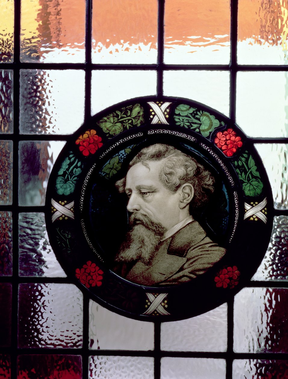 Window showing head of Charles Dickens as an elderly man by J. Winbolt