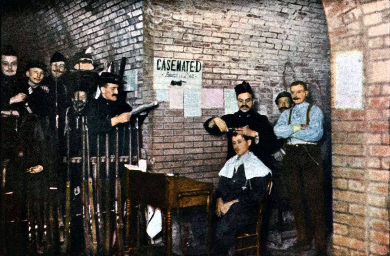 French Soldiers and a Barber in the Casemates, Verdun by Jules Gervais Courtellemont