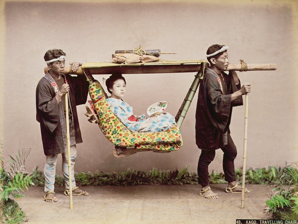 Japanese Geisha being carried in a litter by Kusakabe Kimbei