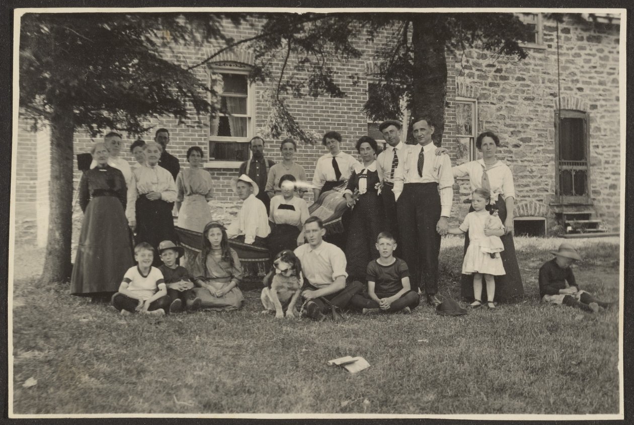 Group Portrait Outside Building by Louis Fleckenstein