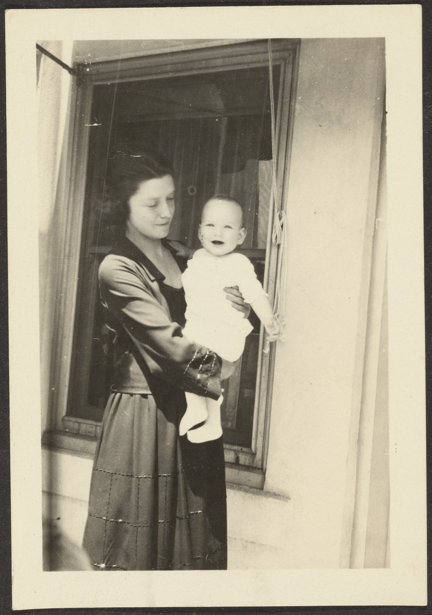 Woman Holding Smiling Baby by Louis Fleckenstein