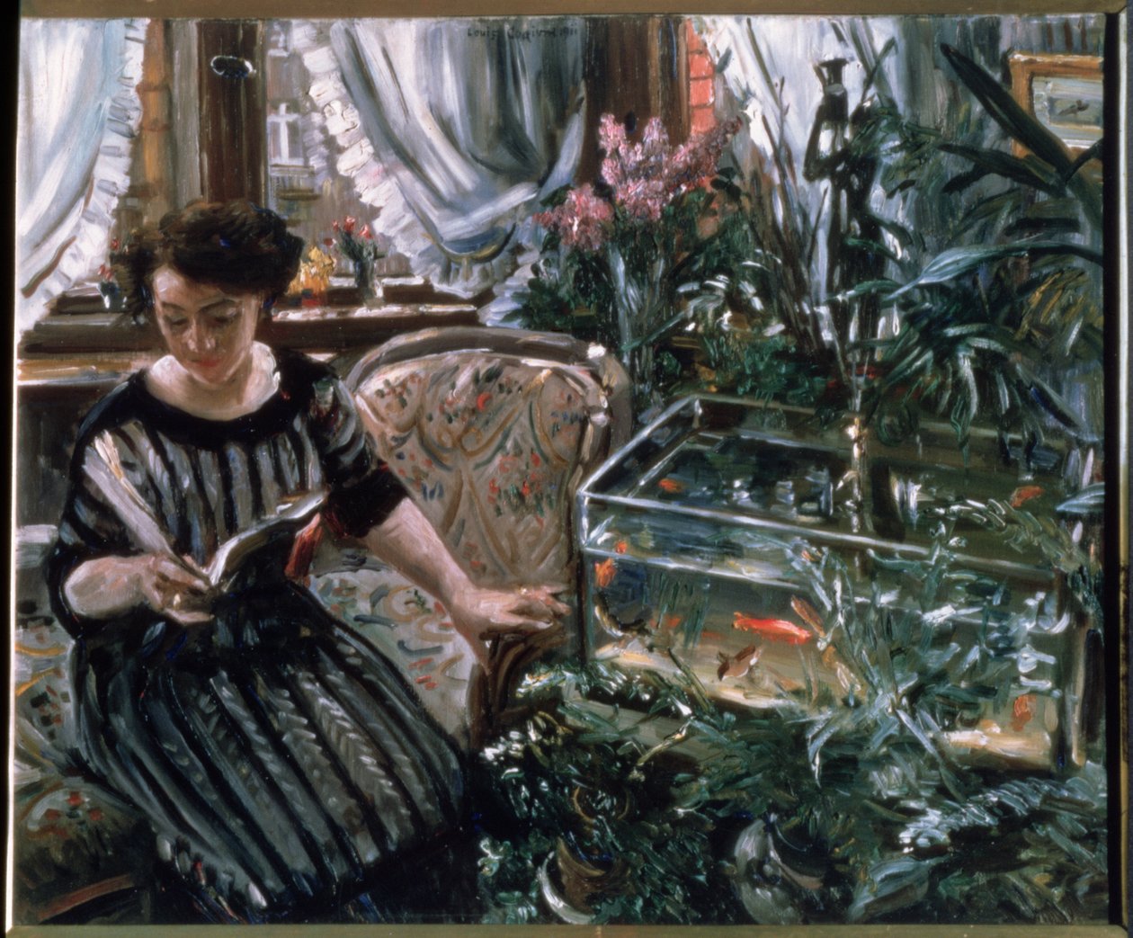 A Woman Reading Near a Goldfish Tank by Lovis Corinth