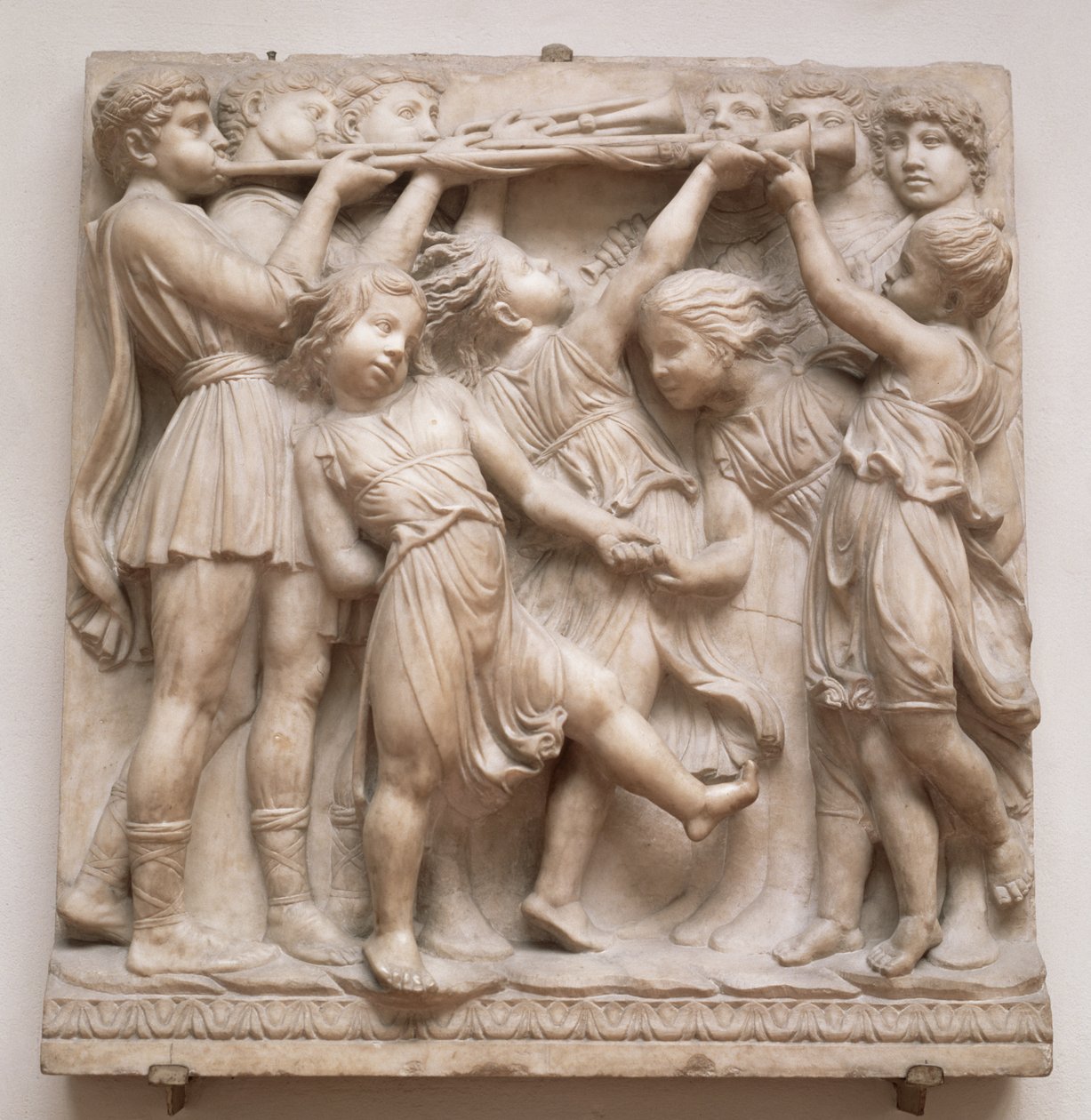 Trumpeting angels, relief from the Cantoria by Luca Della Robbia