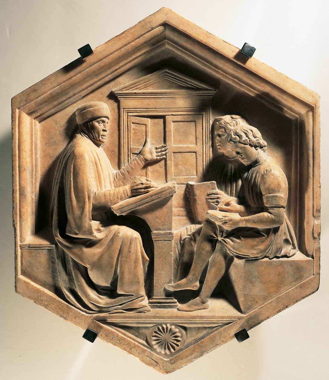 The scholar Priscian, teaching two students by Luca Della Robbia