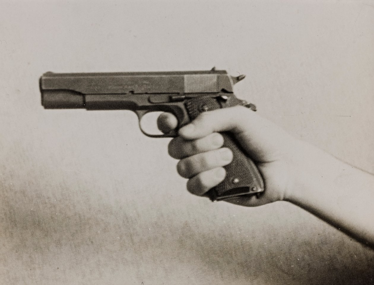 A Hand Holding an Automatic Pistol by Luigi Leoni
