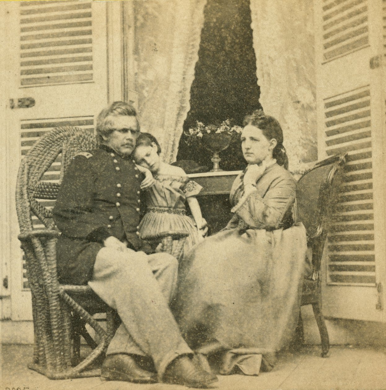 Major General Ord with his wife and child, at the mansion formerly occupied by Jefferson Davis, Richmond, Virginia, 1865 by Mathew B. Brady