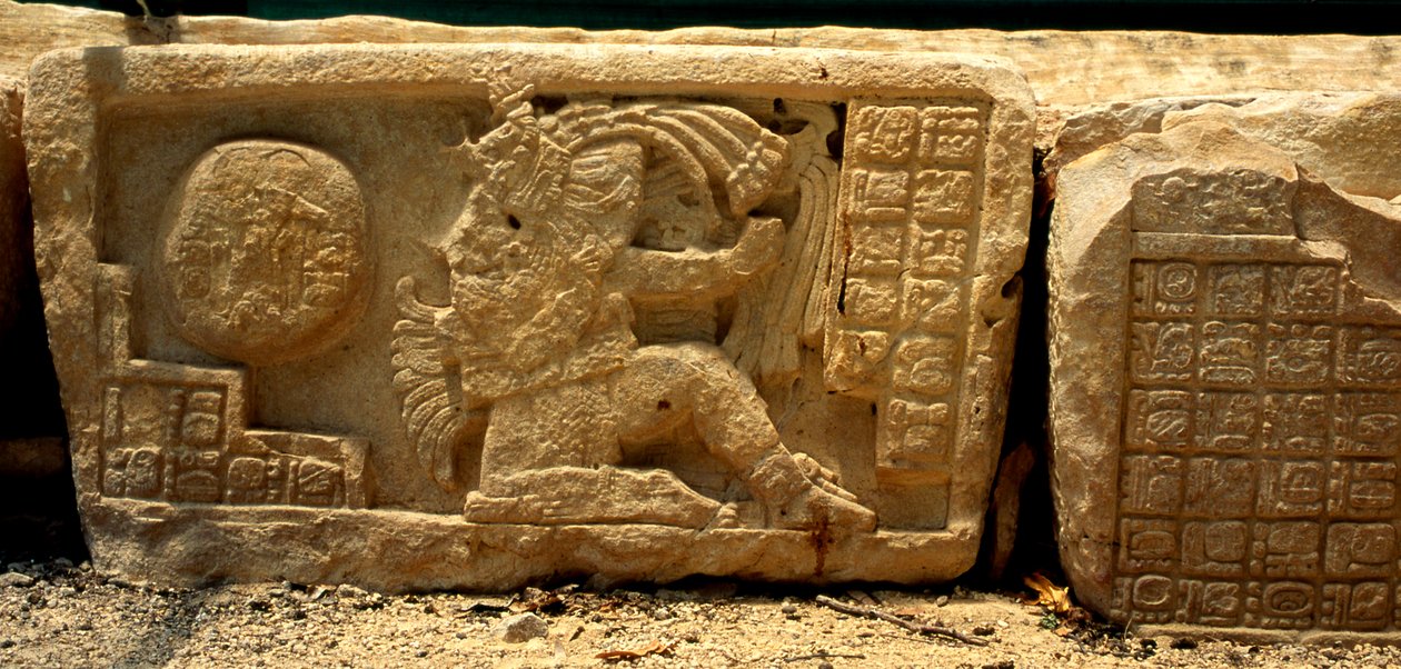 Low relief of a ball game player, the ball, and the glyphs giving a description, late Classic Period by Mayan